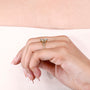 1.5 ct oval diamond engagement ring with vine design band
