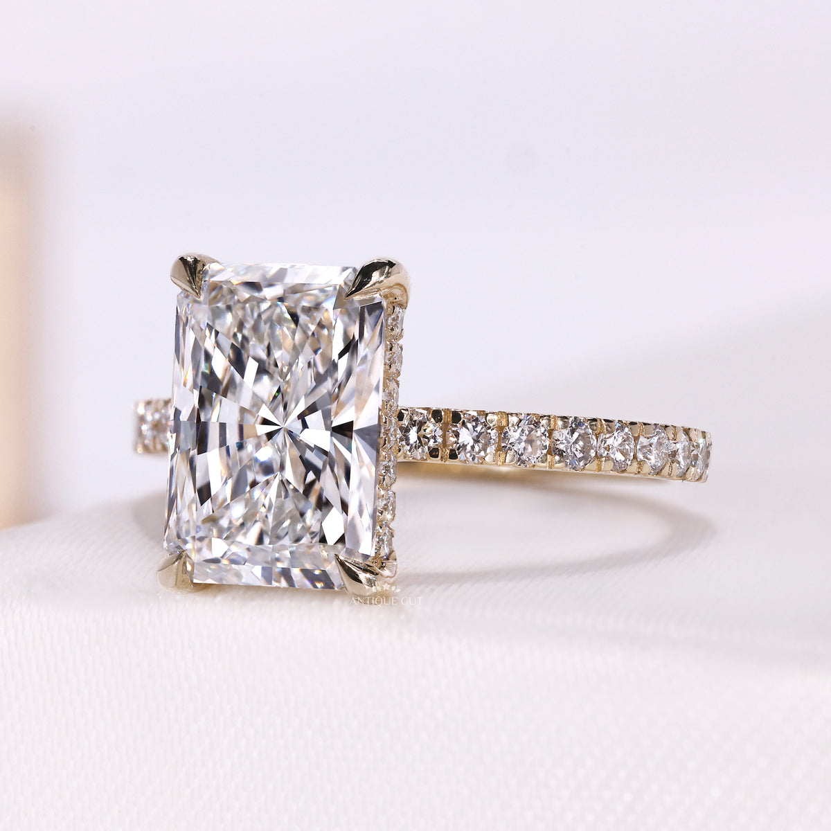 Radiant cut lab grown diamond ring with hidden halo