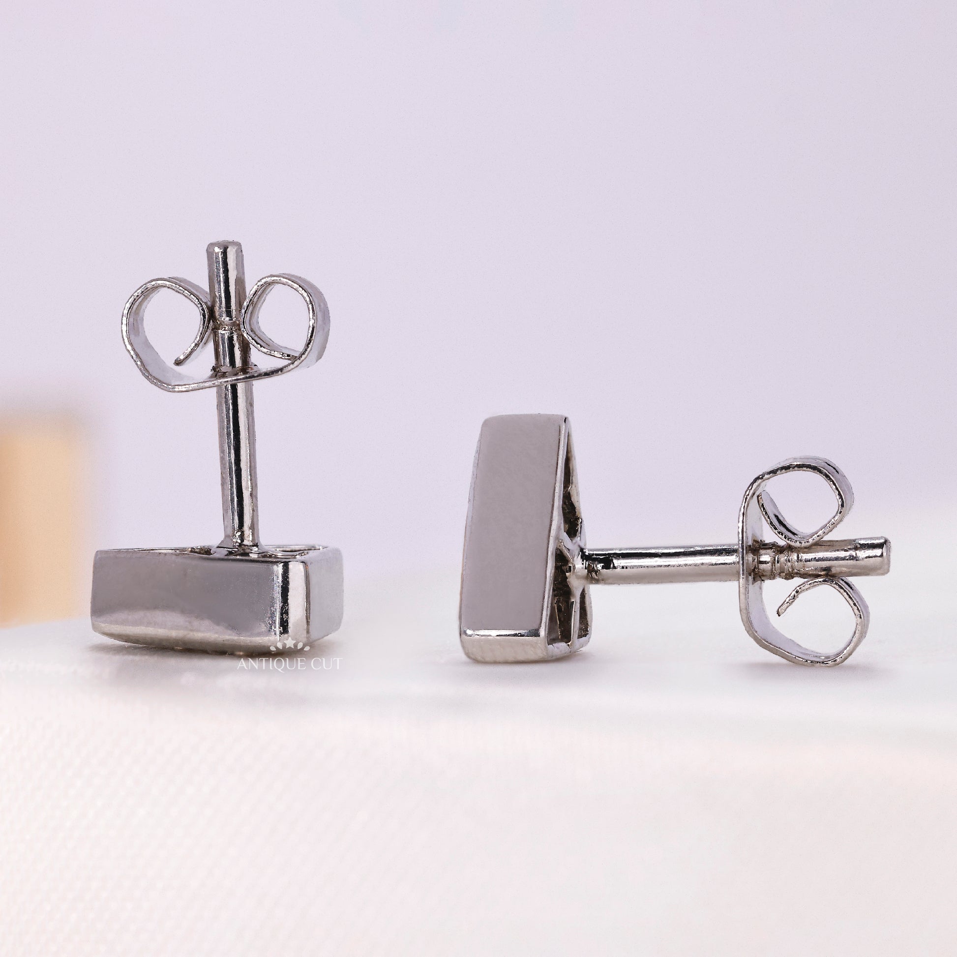 Triangle shaped diamond stud earrings for women