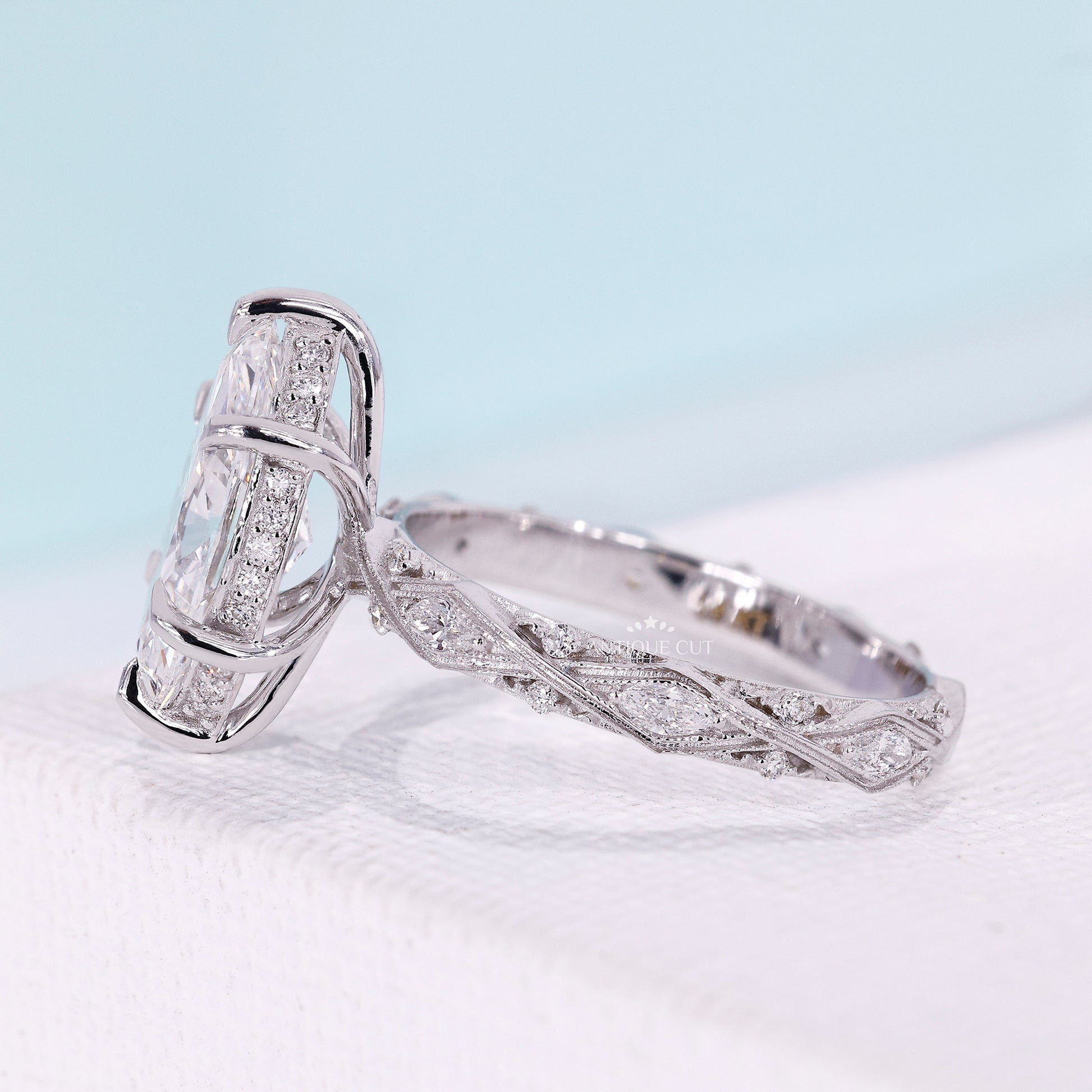 Marquise lab grown diamond ring with side stones
