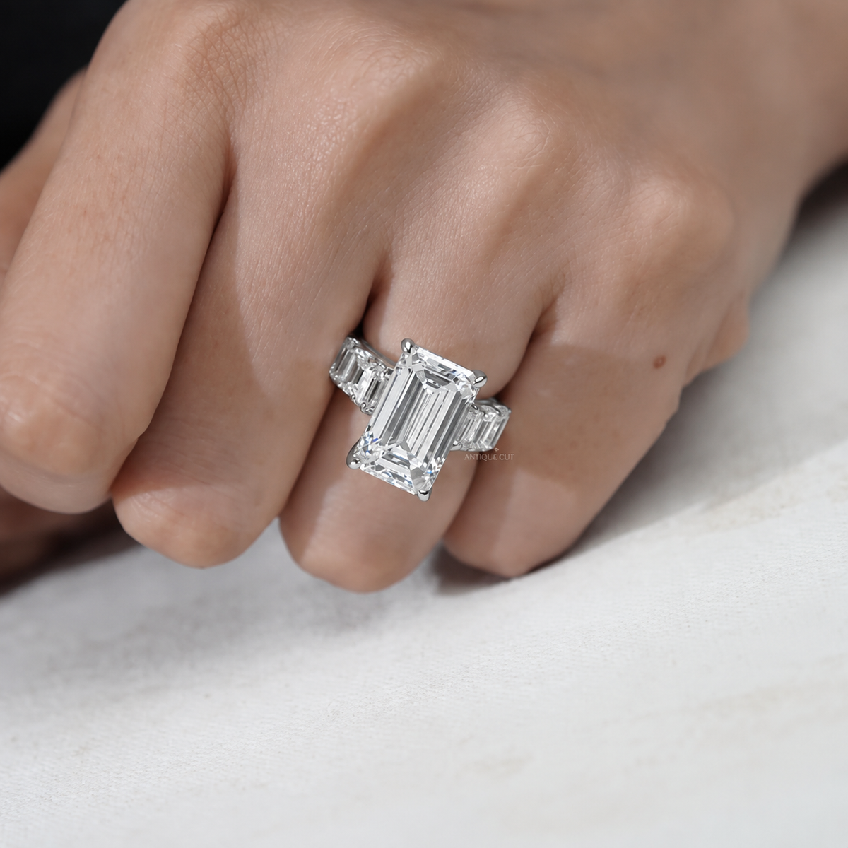9.0 Carat Lab Grown Emerald Cut Engagement Ring with Tapered Side Stones