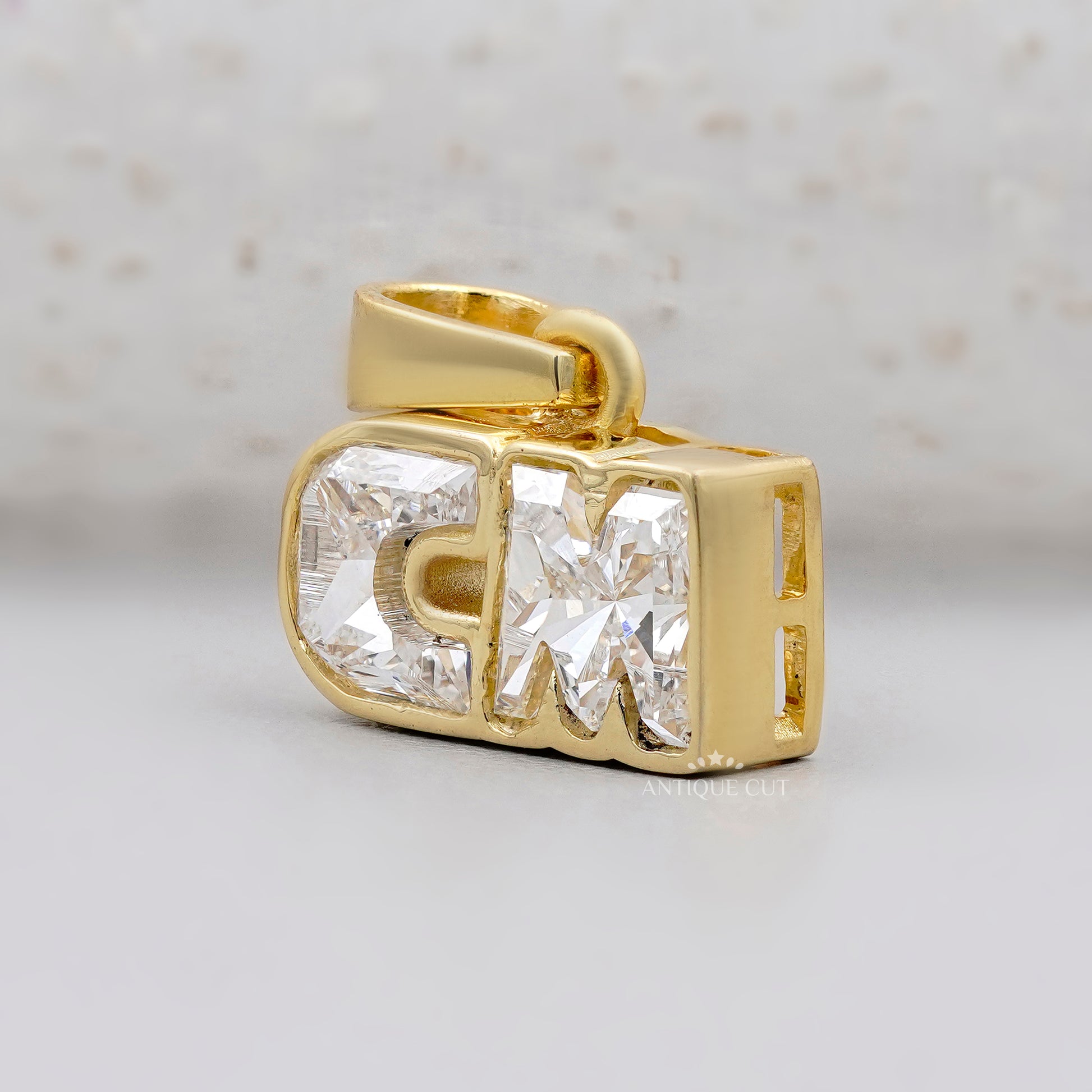 Yellow gold CM diamond letter necklace