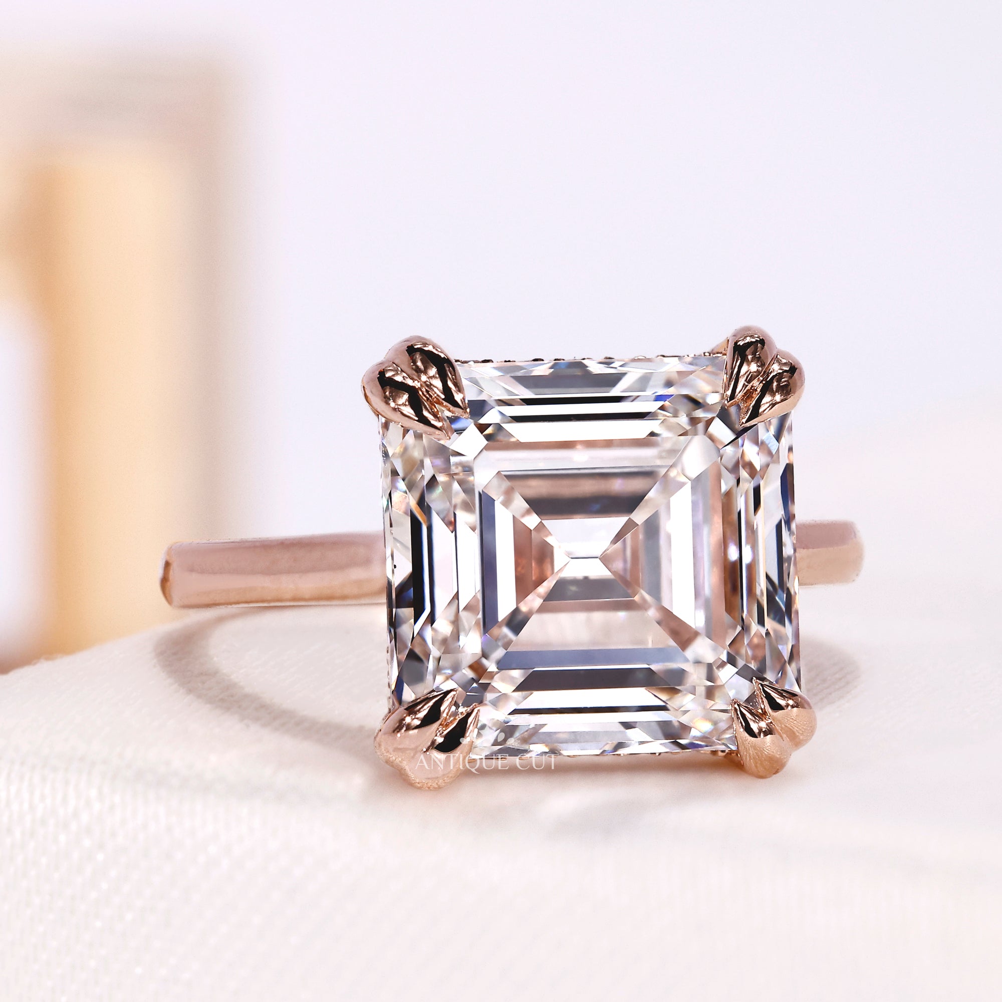 Asscher cut lab grown diamond solitaire ring with hidden halo setting