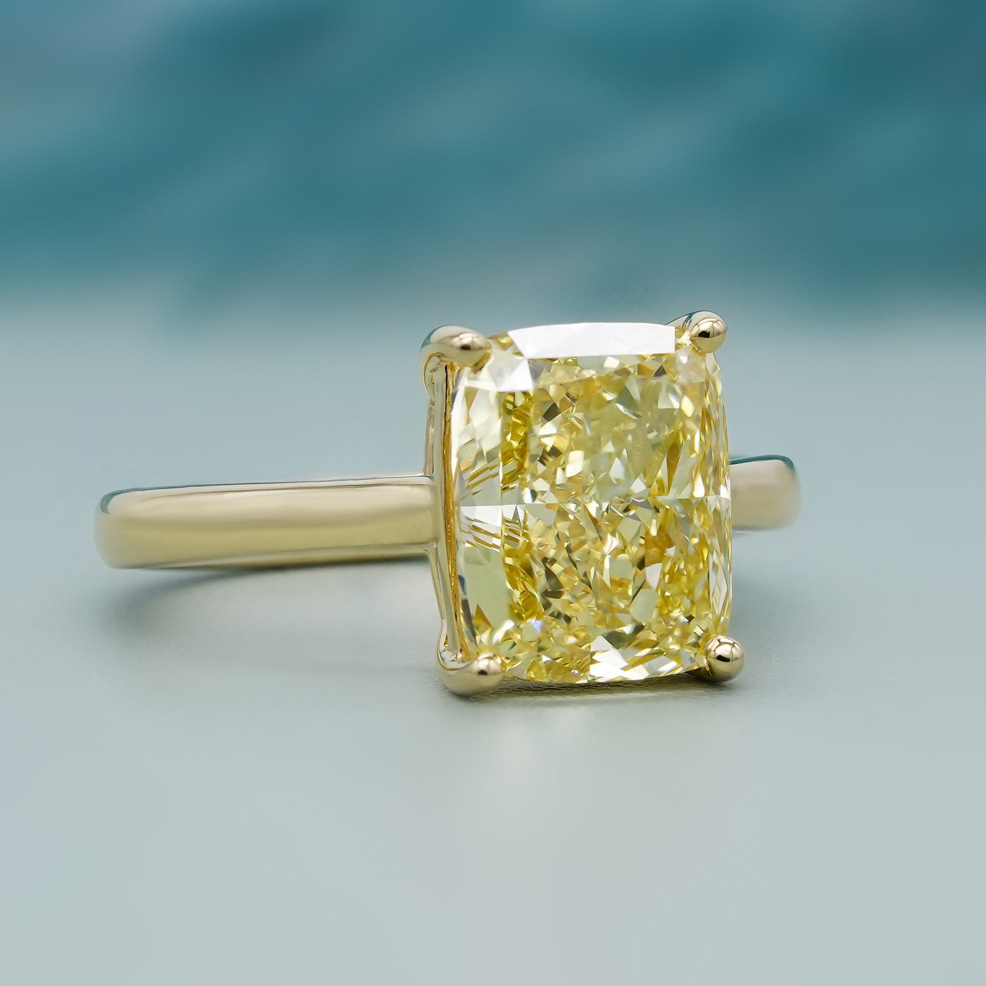 IGI certified yellow radiant cut diamond ring gold