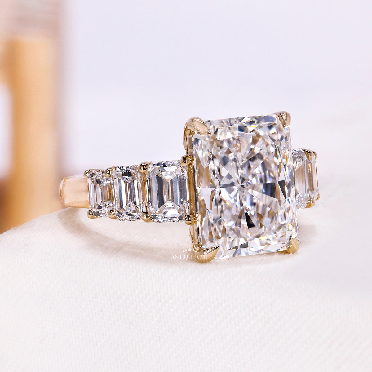 Close-up of rectangular radiant cut center stone