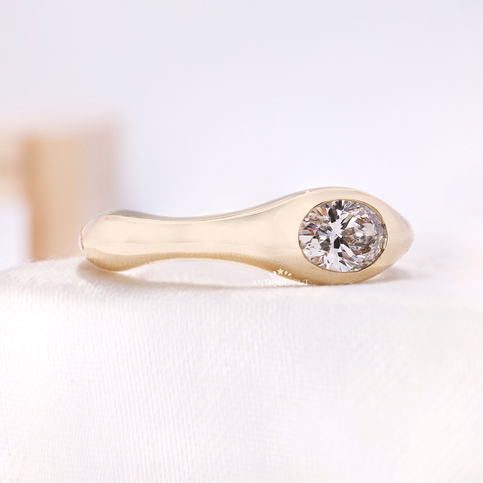 0.50 Carat East West Oval Lab Grown Diamond Bezel Set Engagement Ring