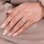 Round lab grown diamond engagement ring featuring four white gold prongs