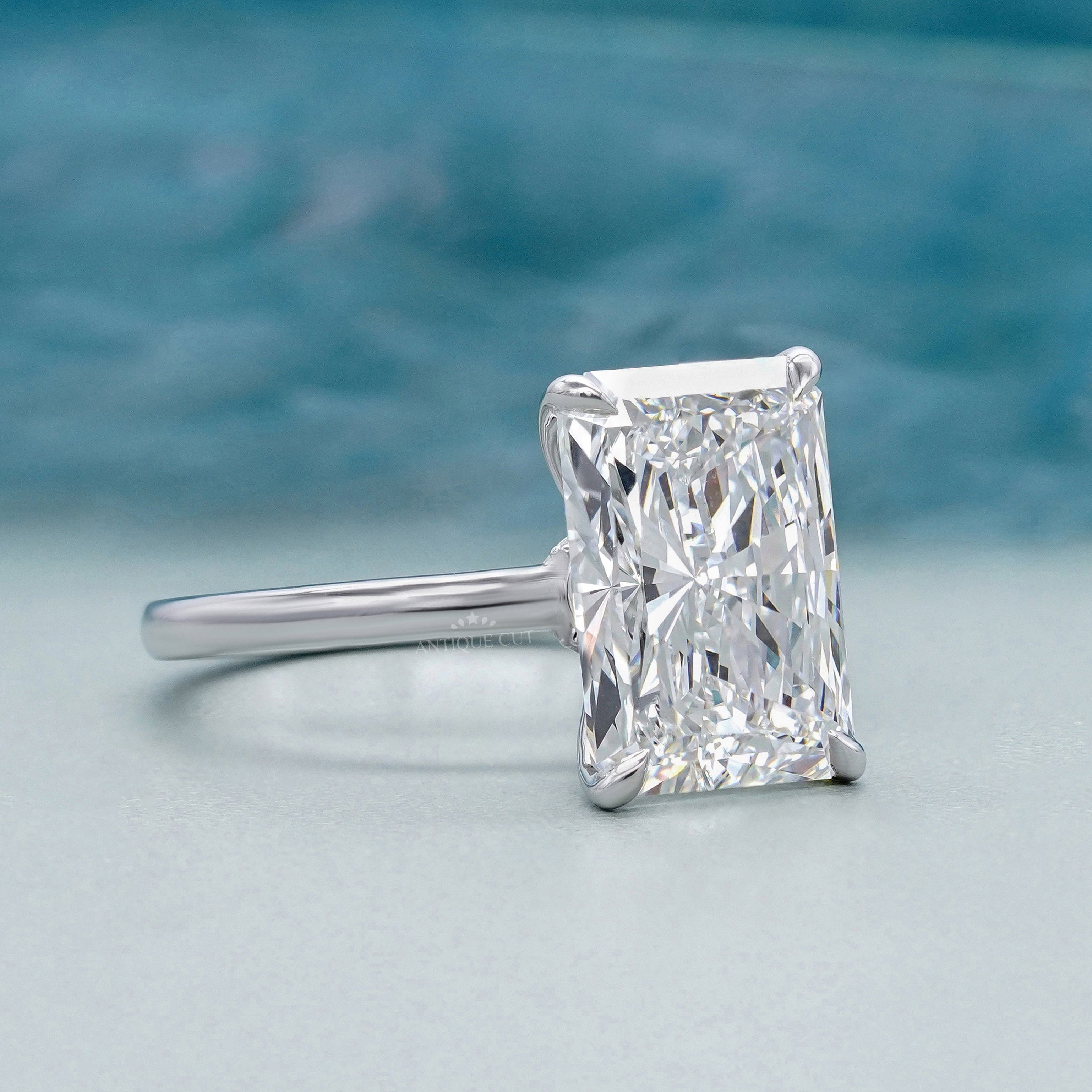 White gold radiant diamond ring with hidden halo