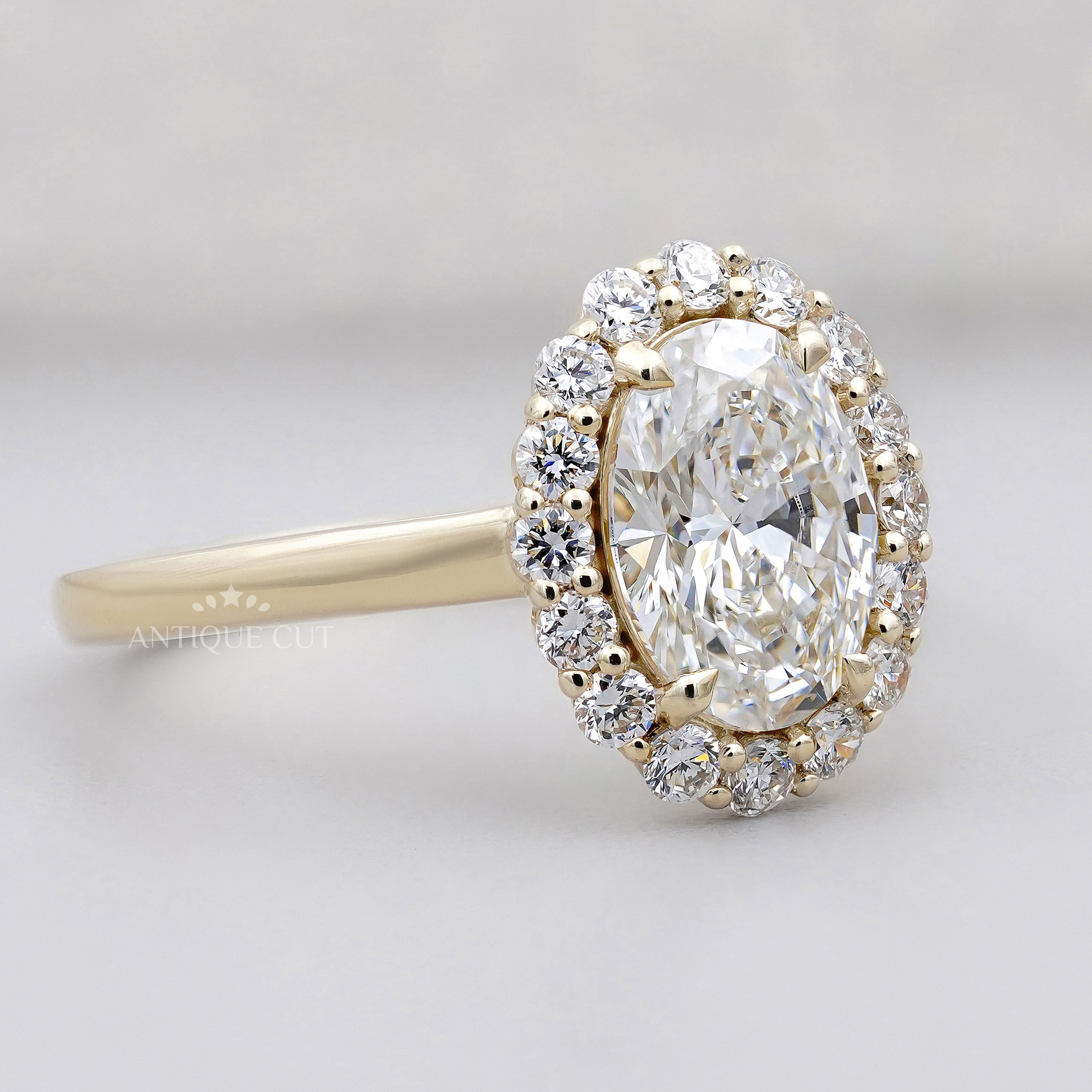 14k yellow gold oval halo engagement ring