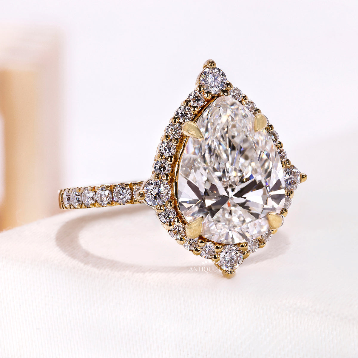 3.50 Carat Pear Cut Diamond Engagement Ring With Halo and Pave Band