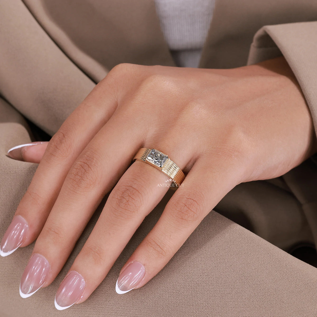 1.50 carat emerald cut lab grown diamond in an east west setting