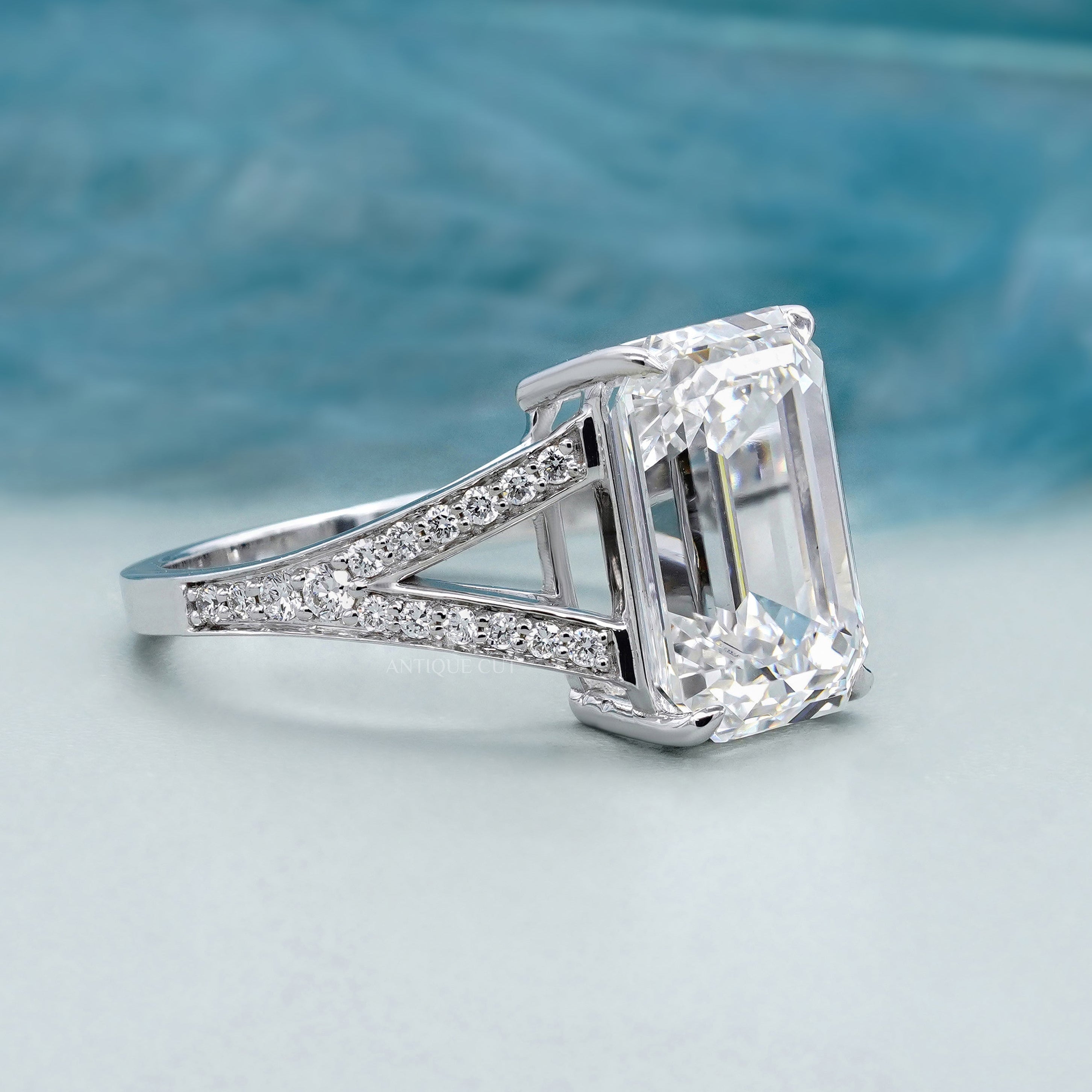 Elegant emerald cut diamond engagement ring with split shank