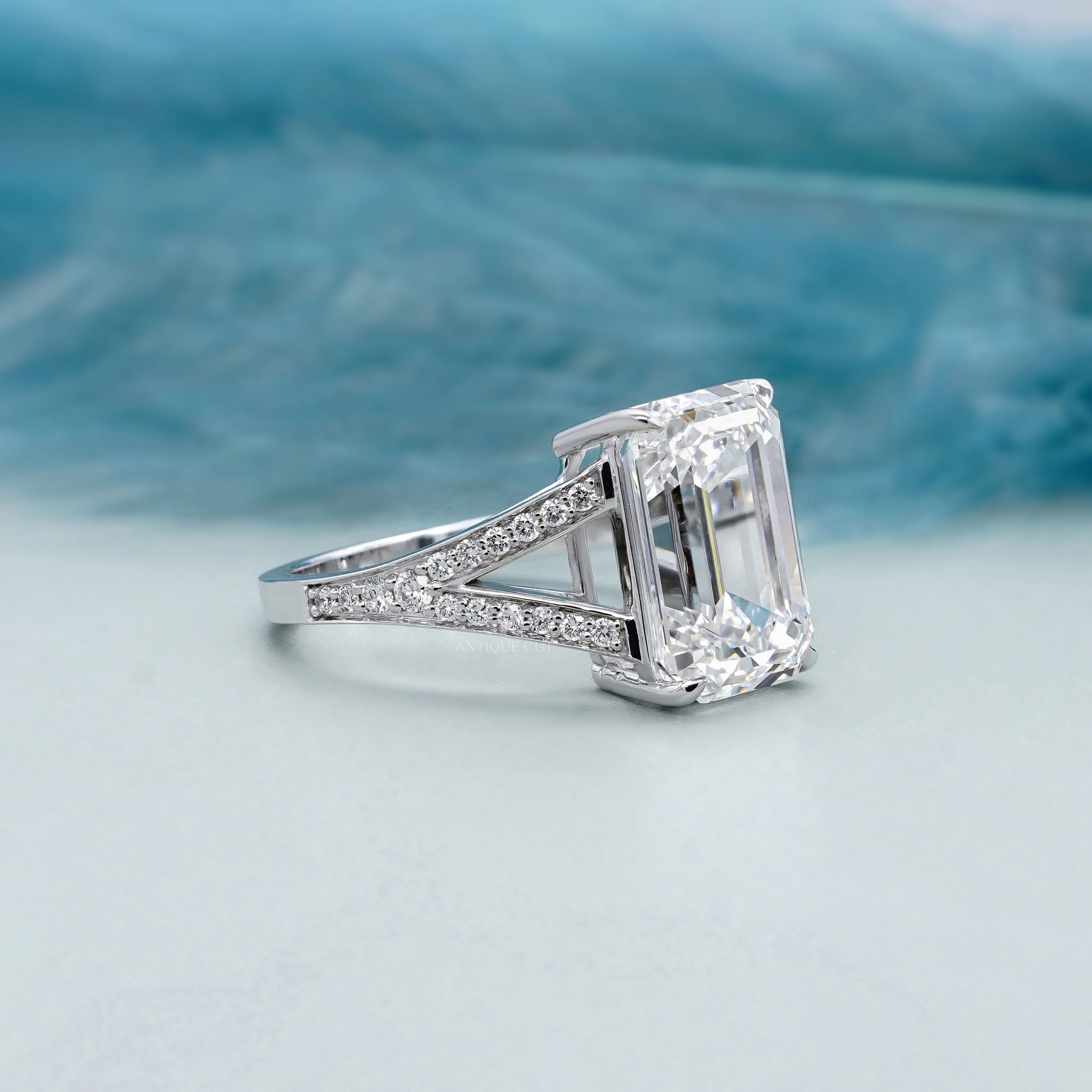 Elegant emerald cut diamond engagement ring with split shank