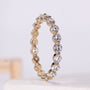 Round diamond eternity wedding band crafted in yellow gold