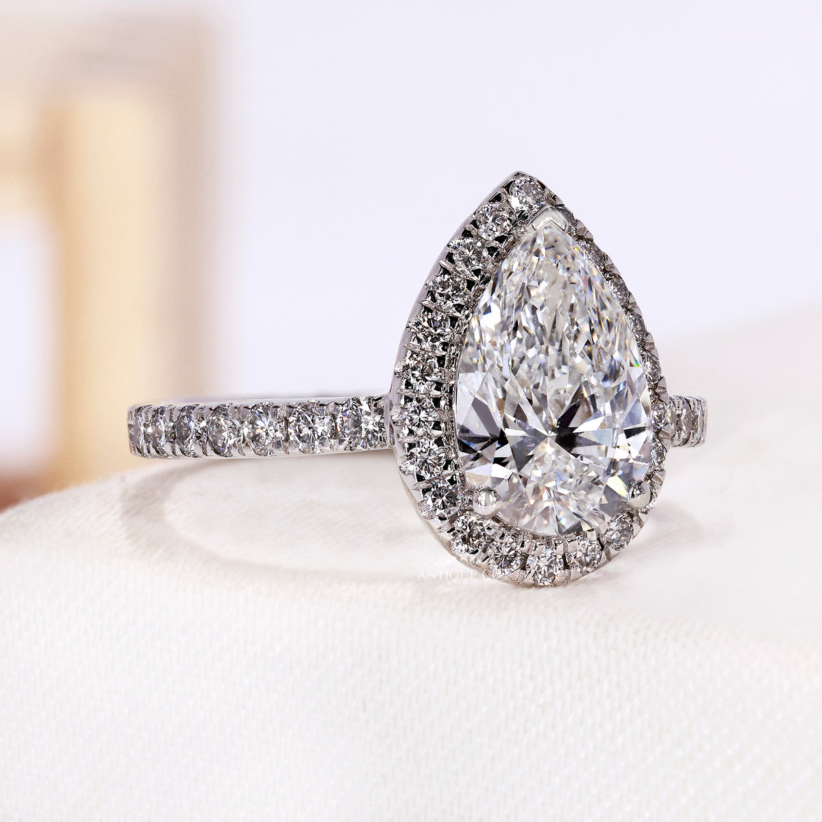 1.50 Carat Pear Shaped Halo Engagement Ring With Pave Band | IGI Certified