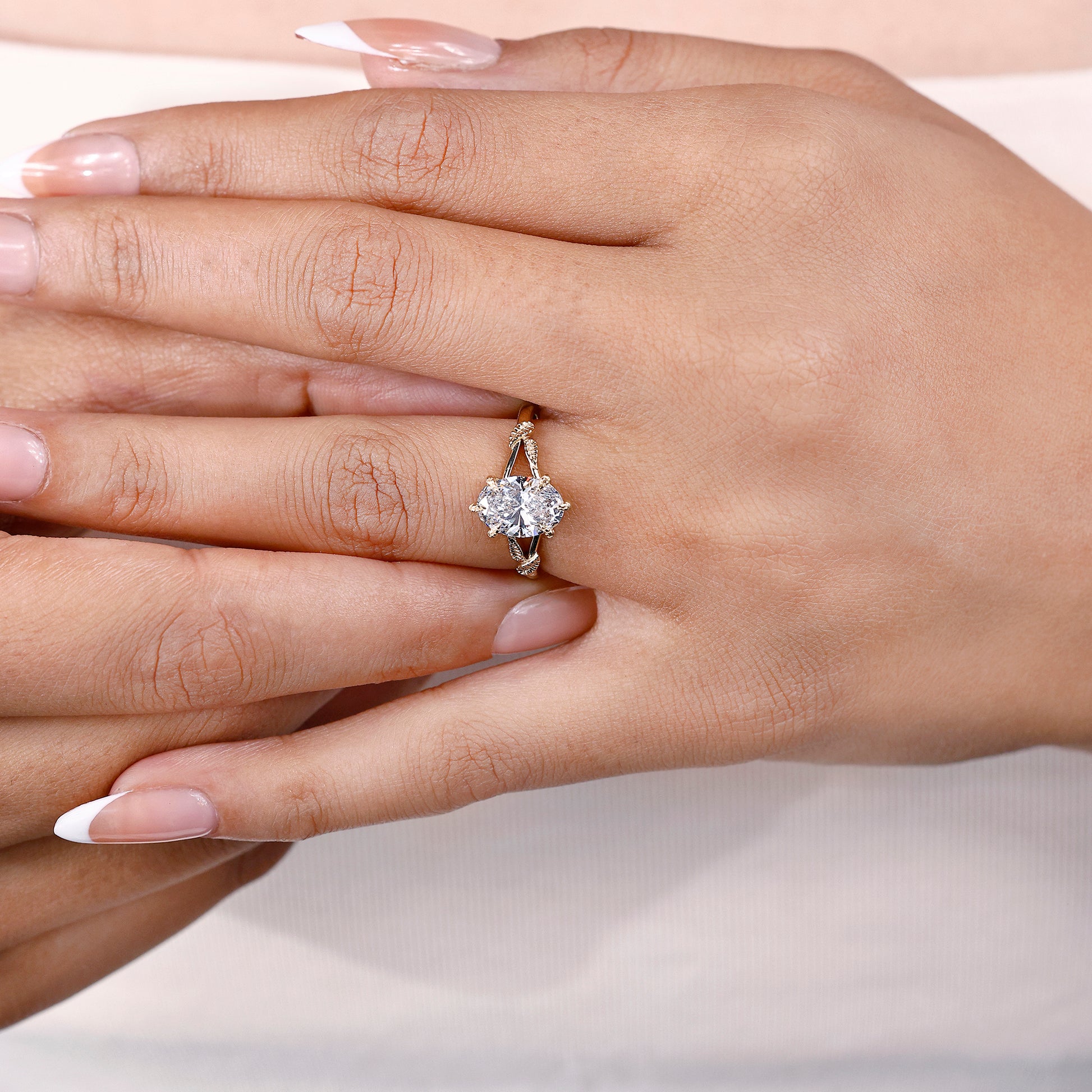 Lab grown oval diamond ring with botanical inspired setting
