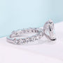 Women’s oval engagement ring in white gold
