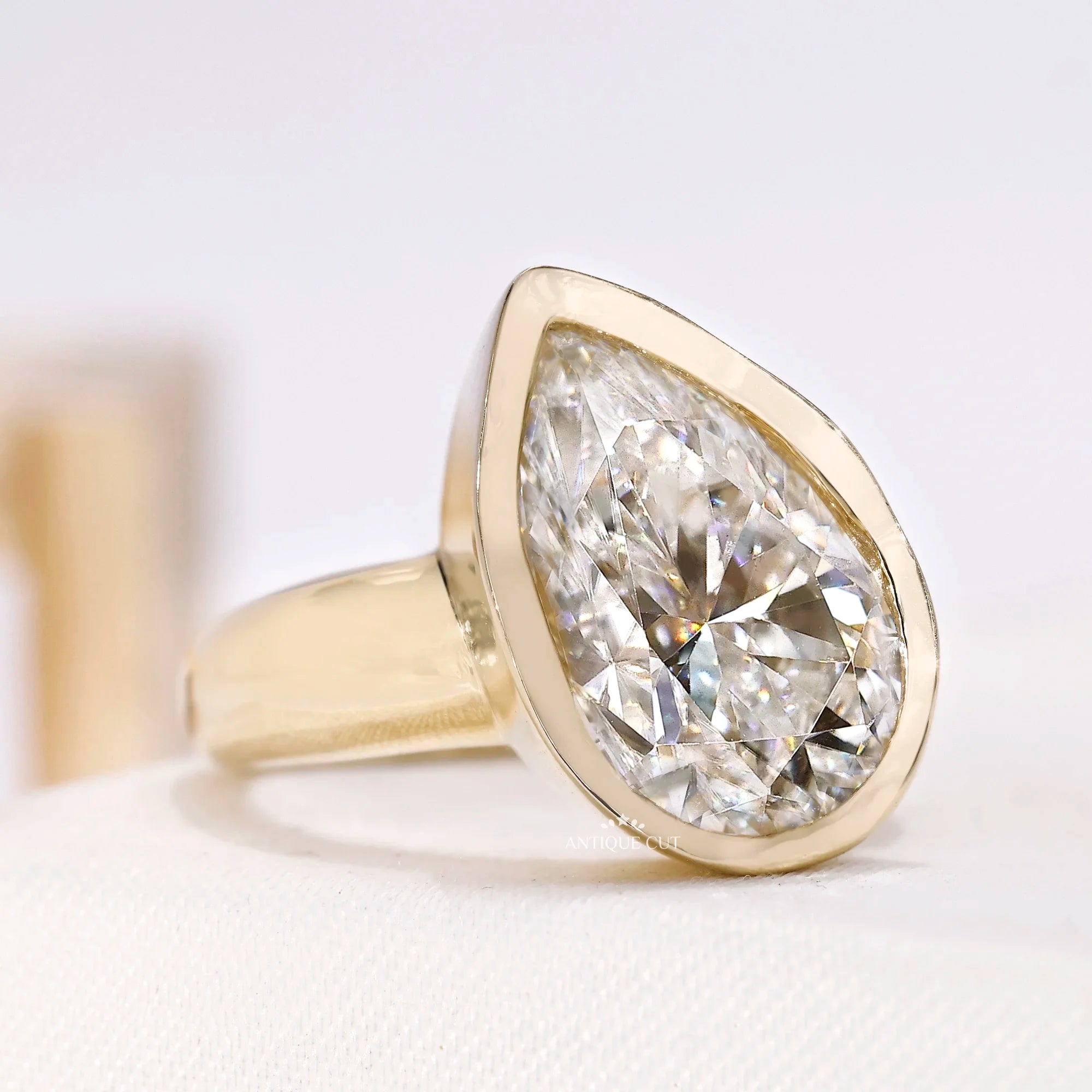 5.00 Carat Pear Lab Grown Diamond Ring With Bezel Setting | Yellow Gold | IGI Certified