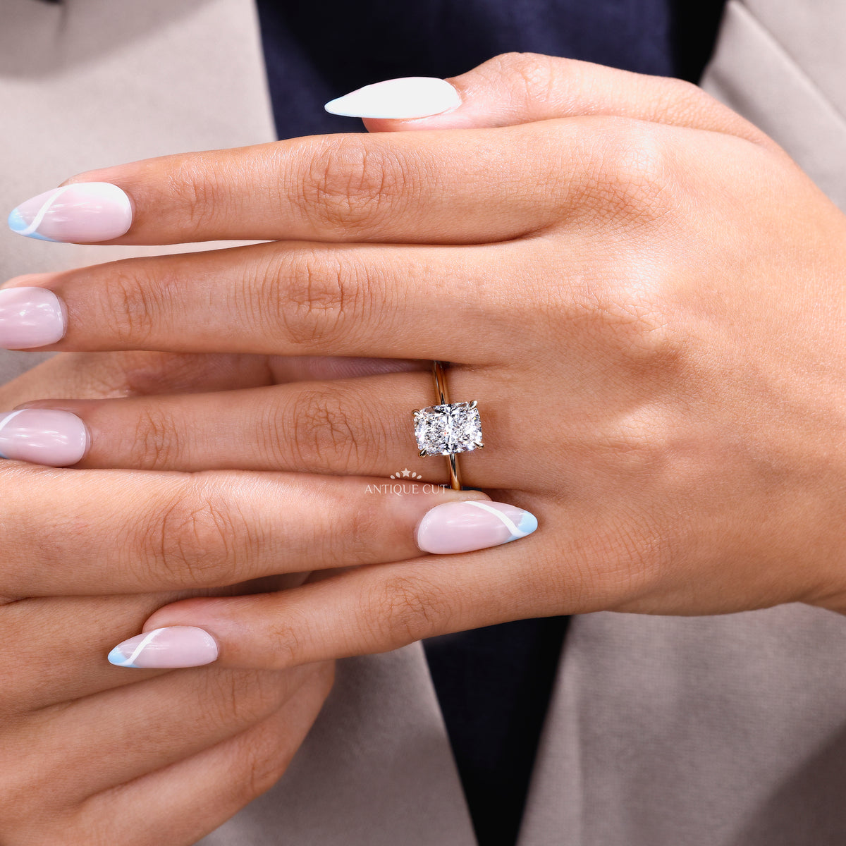 Elongated cushion diamond ring with hidden halo setting