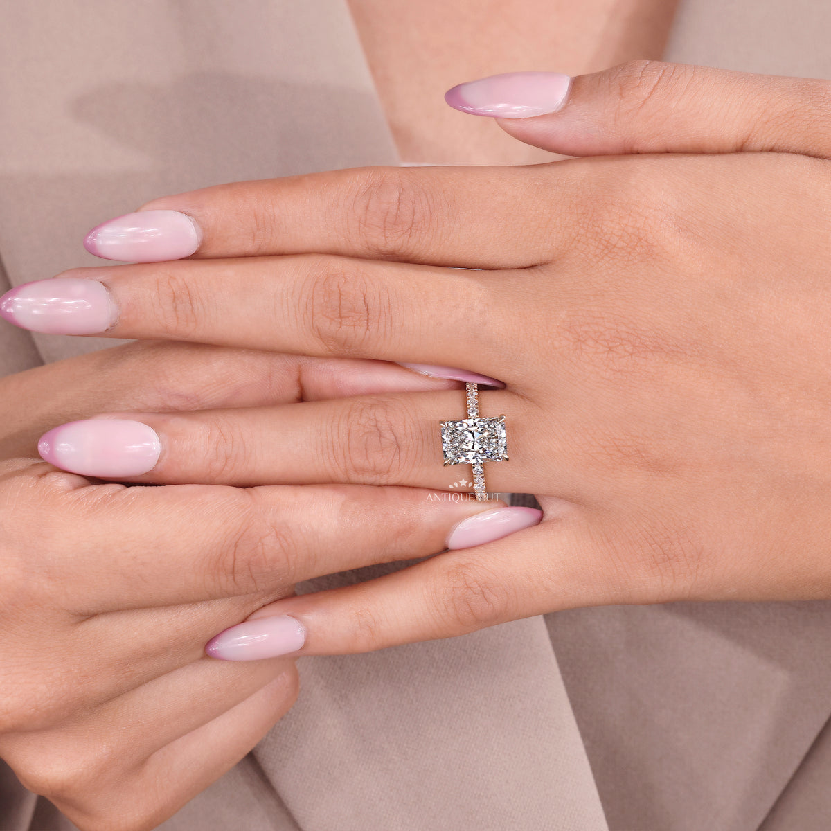 Radiant diamond hidden halo engagement ring