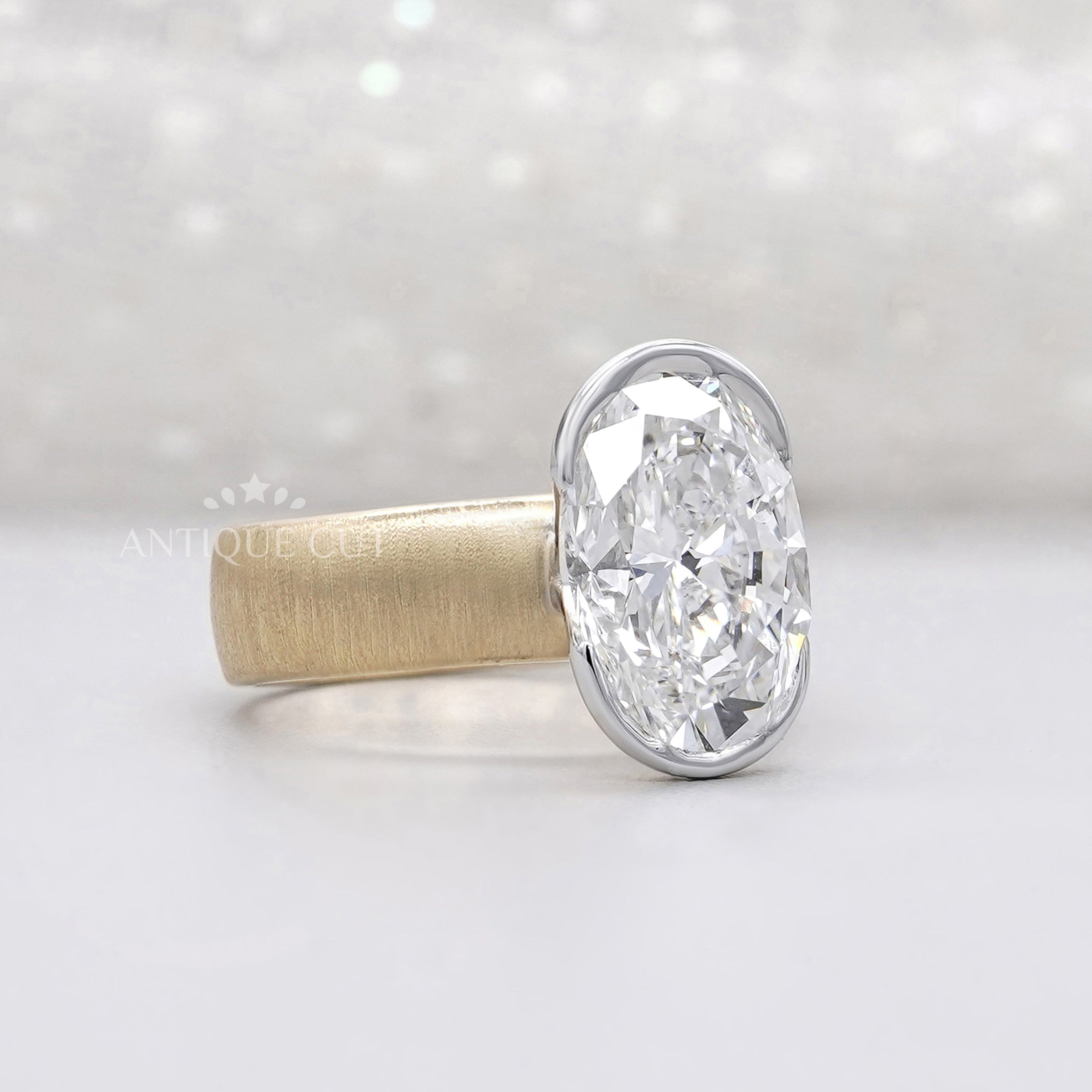 Oval solitaire diamond engagement ring with paper matte finish