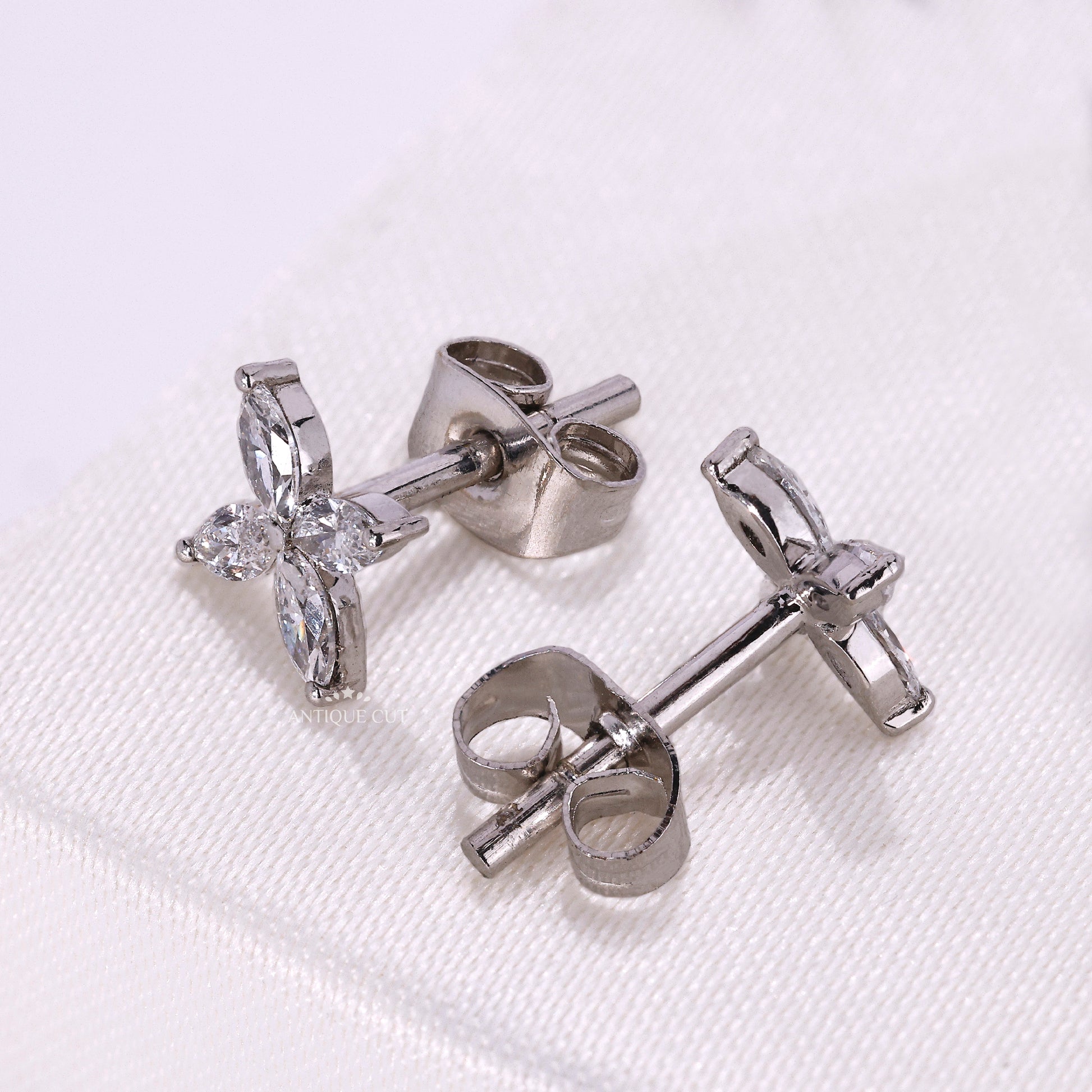 Elegant marquise cluster stud earrings with diamond accents