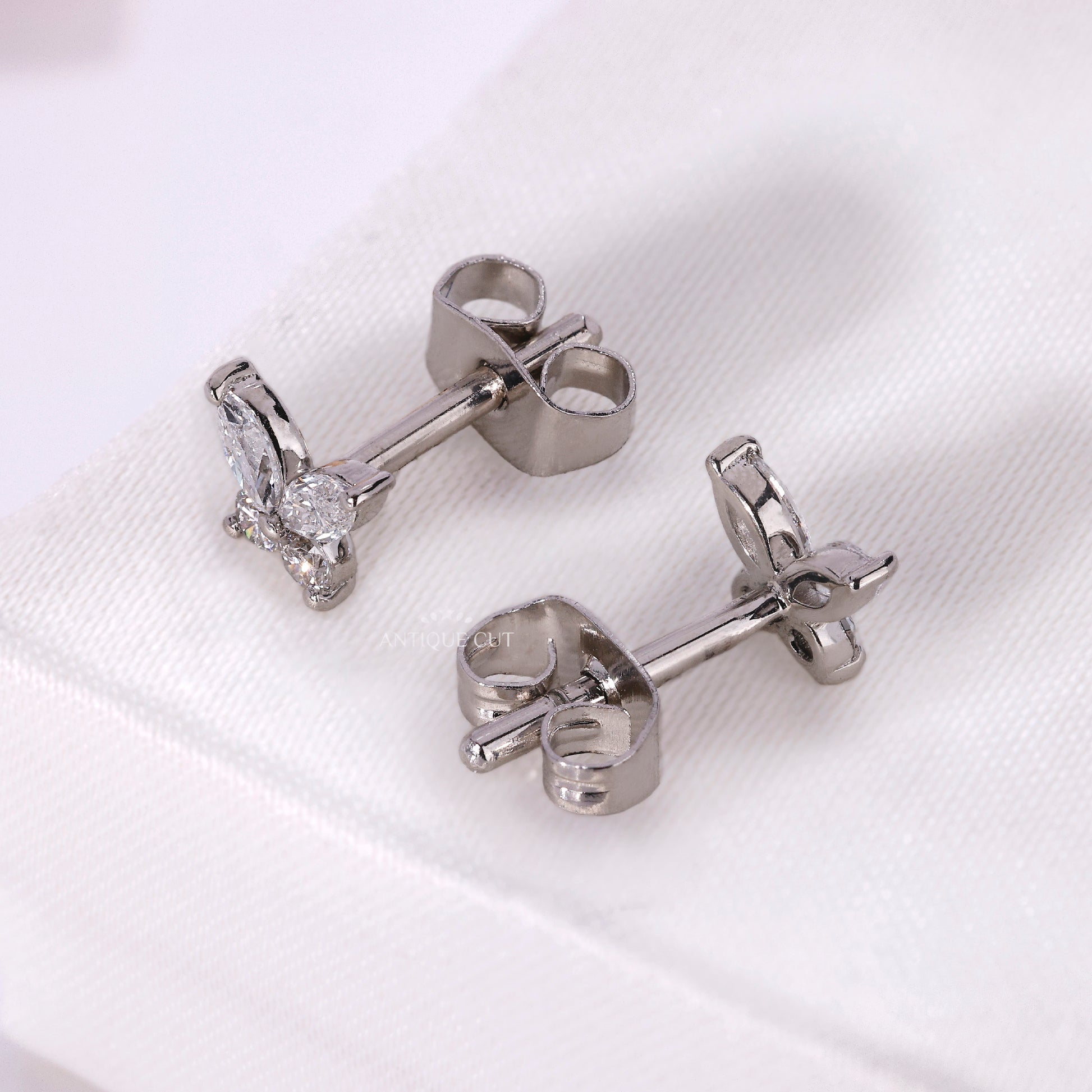 Marquise and pear shaped diamond butterfly stud earrings