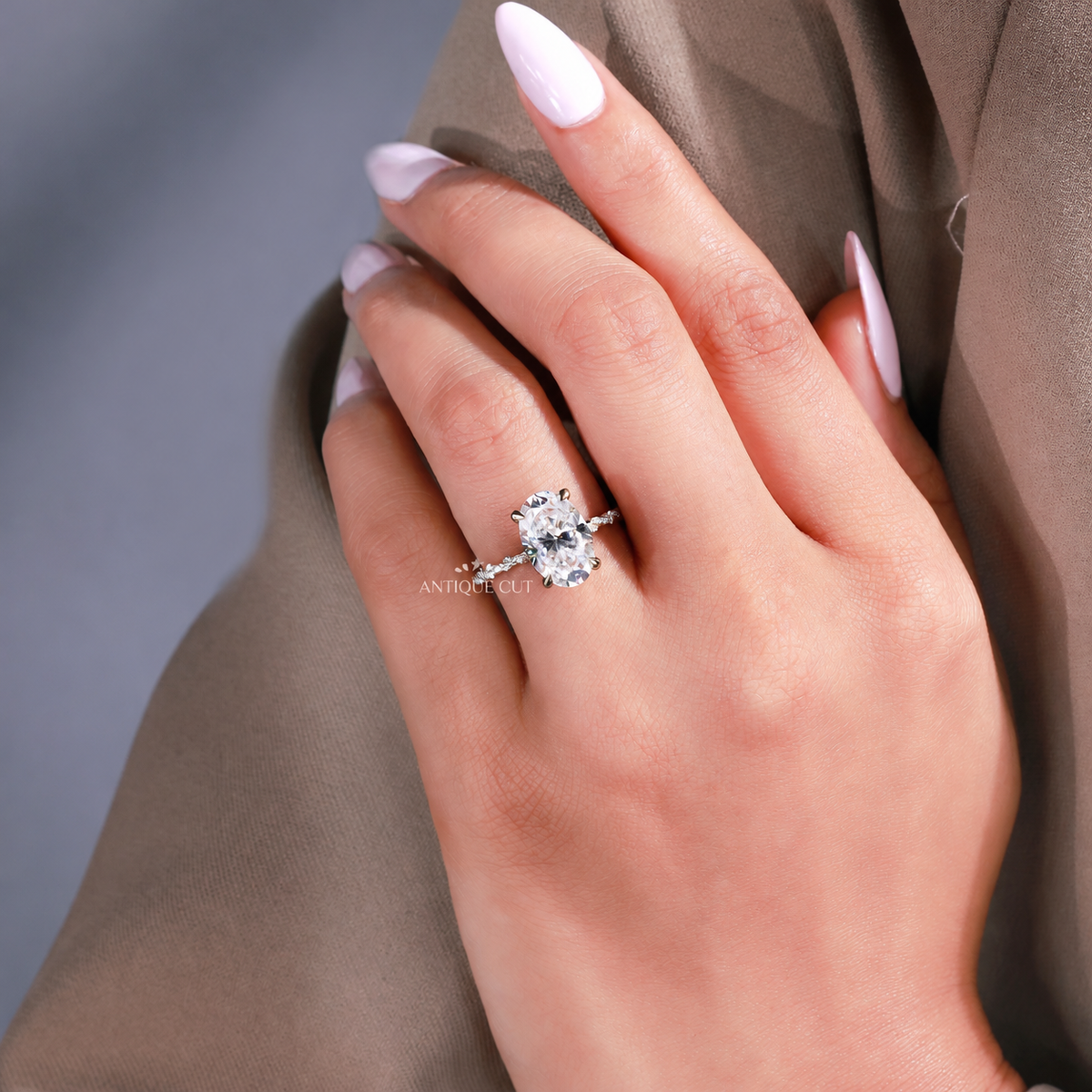 6.00 Carat Oval Diamond Engagement Ring With Hidden Halo & Twisted Band | IGI Certified