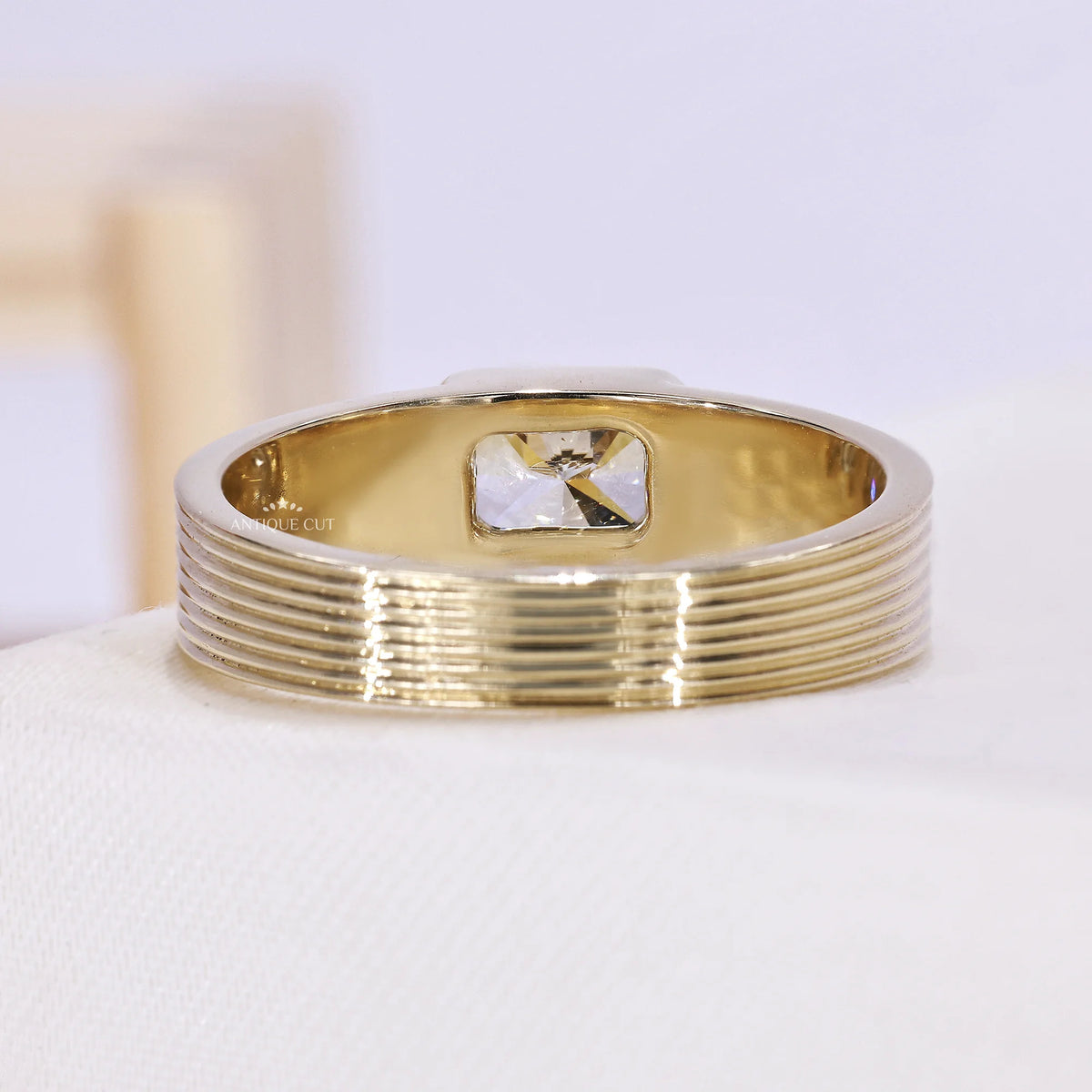 Rectangular lab grown diamond engagement ring crafted in yellow gold