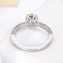 Antiquecut engagement ring featuring a round diamond in white gold