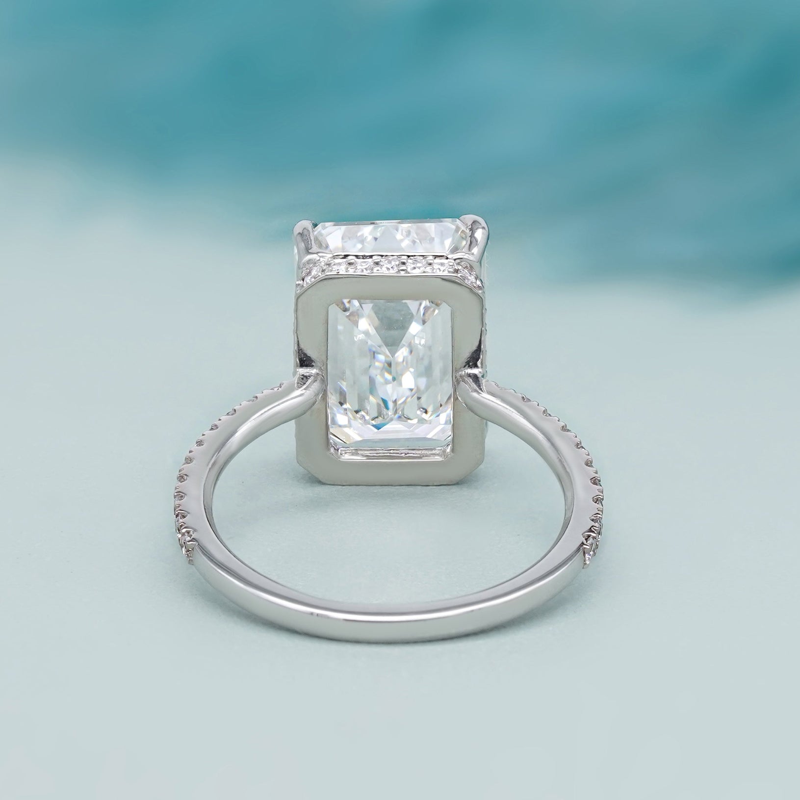 emerald cut diamond ring with hidden halo