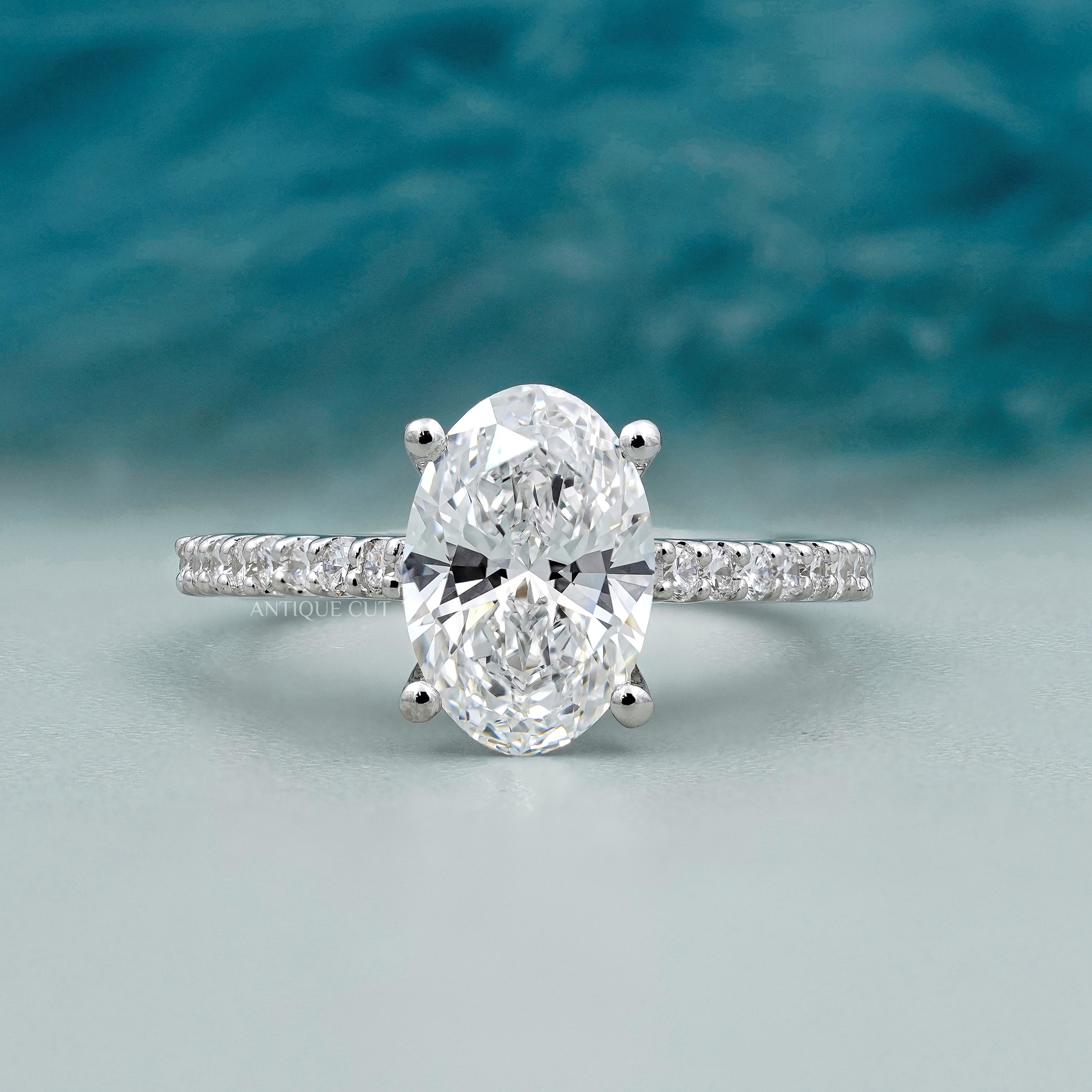 Oval Cut Diamond Ring with Pave Band in White Gold | IGI Certified