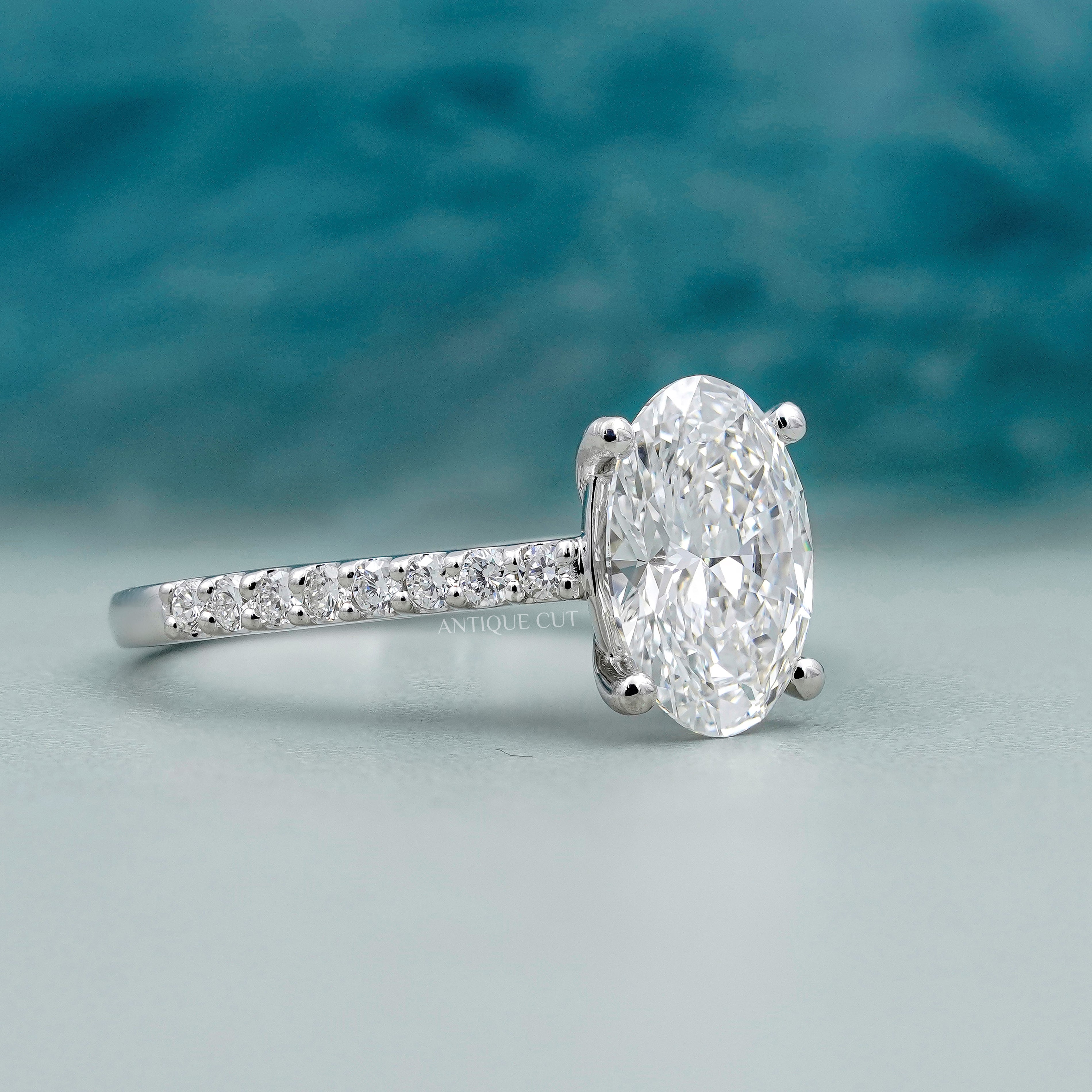 Oval Cut Diamond Ring with Pave Band in White Gold | IGI Certified