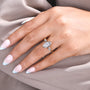 Three stone diamond ring with marquise center