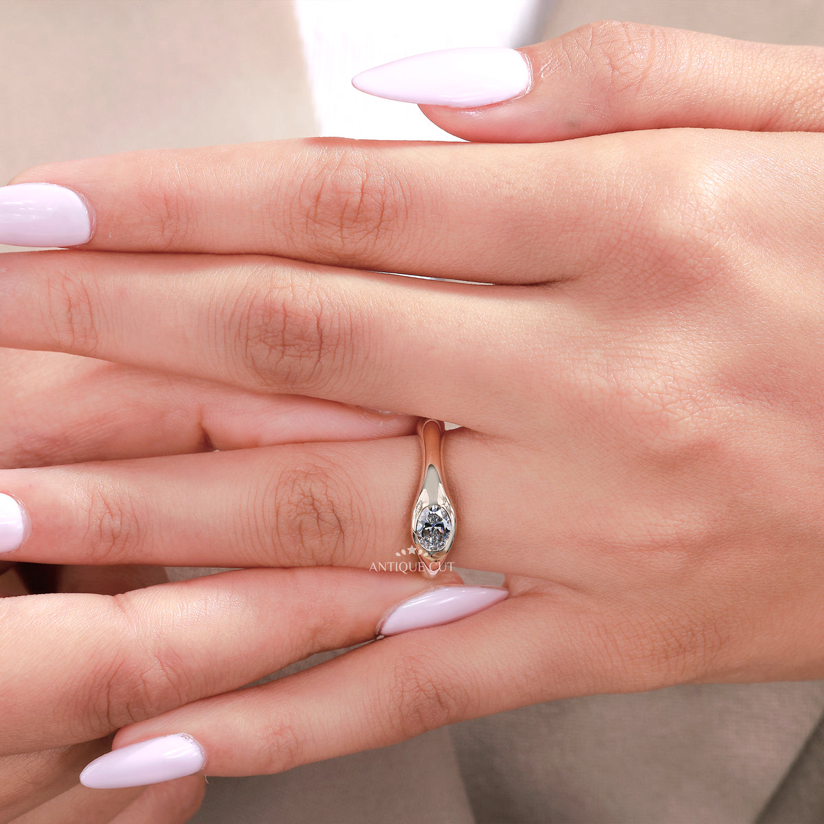 0.50 Carat East West Oval Lab Grown Diamond Bezel Set Engagement Ring