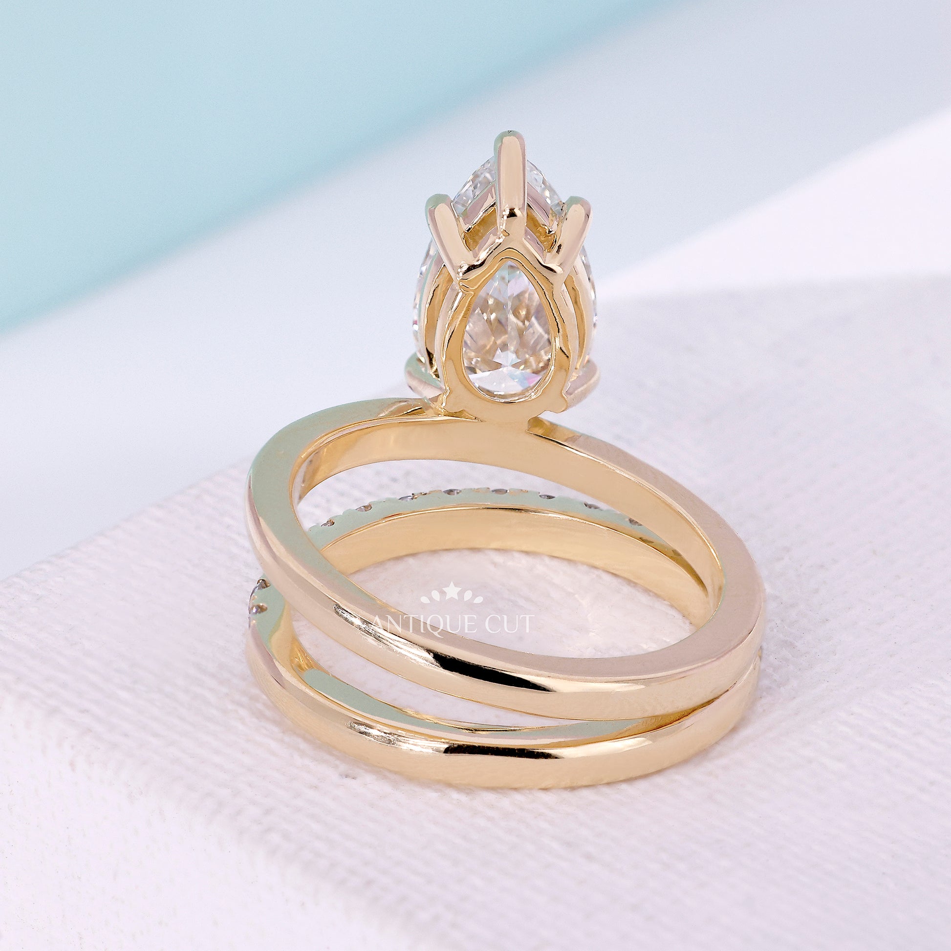 Antiquecut engagement ring with pear lab grown diamond
