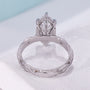 Antiquecut engagement ring with a six-claw setting
