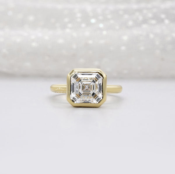 Vintage inspired engagement ring with diamond halo design