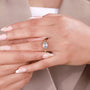 Vintage inspired cushion ring showing claw accents around the center