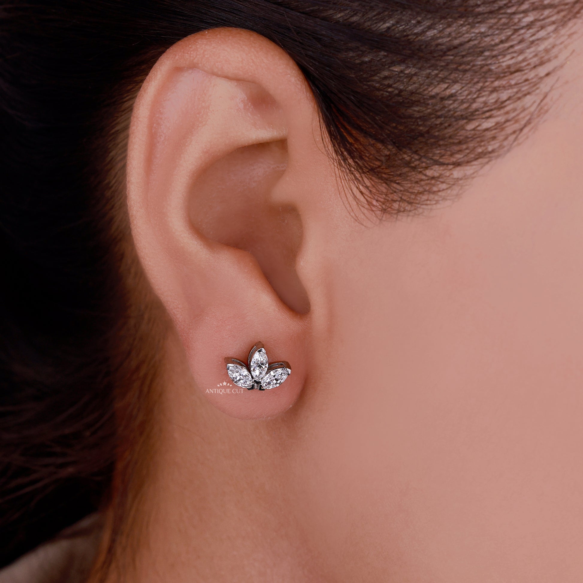 Marquise cut diamond stud earrings in white gold