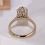 Oval solitaire ring with vintage-style cathedral shoulders