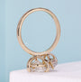 Yellow gold toi et moi ring featuring dual pear shaped diamonds