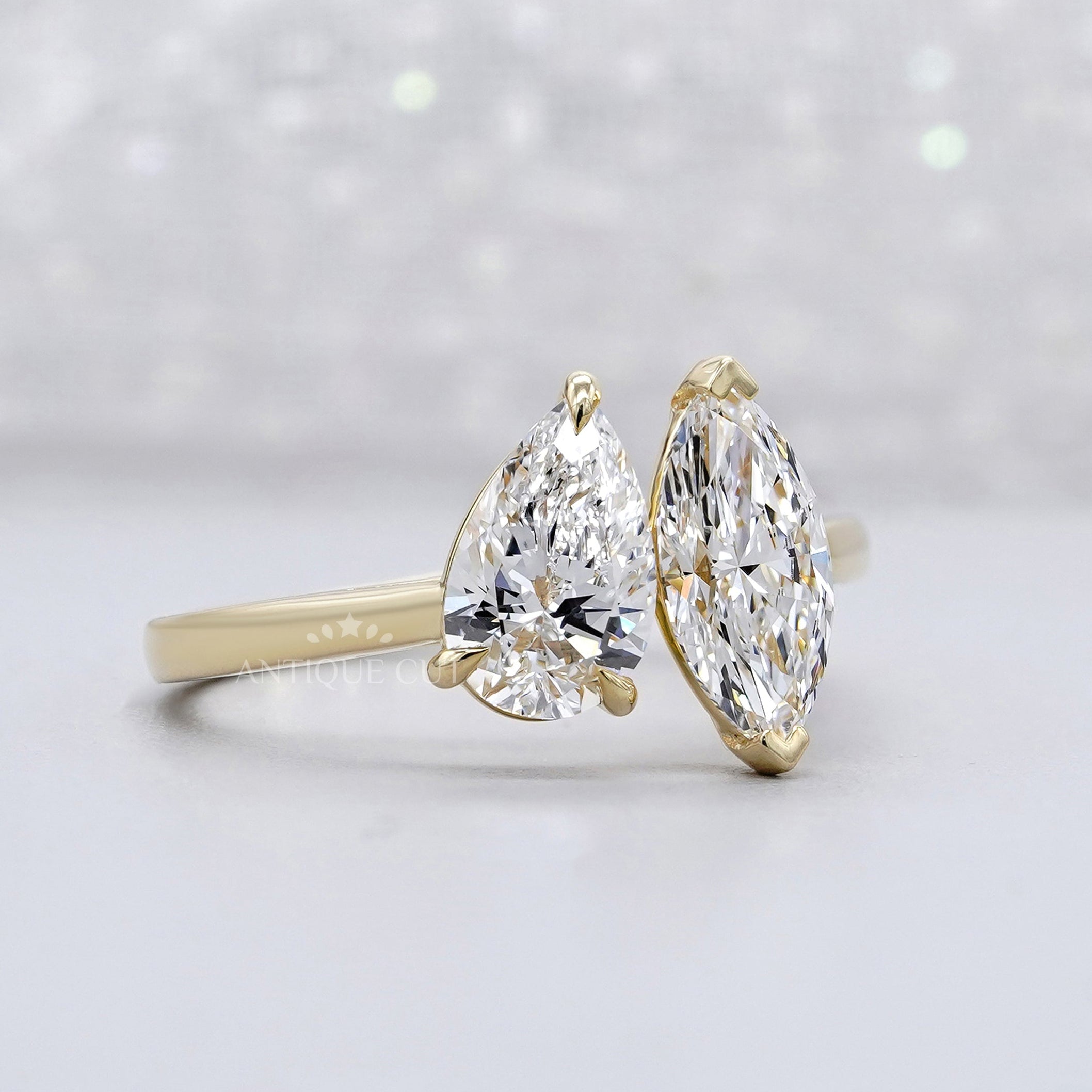 Elegant pear and marquise diamond ring design