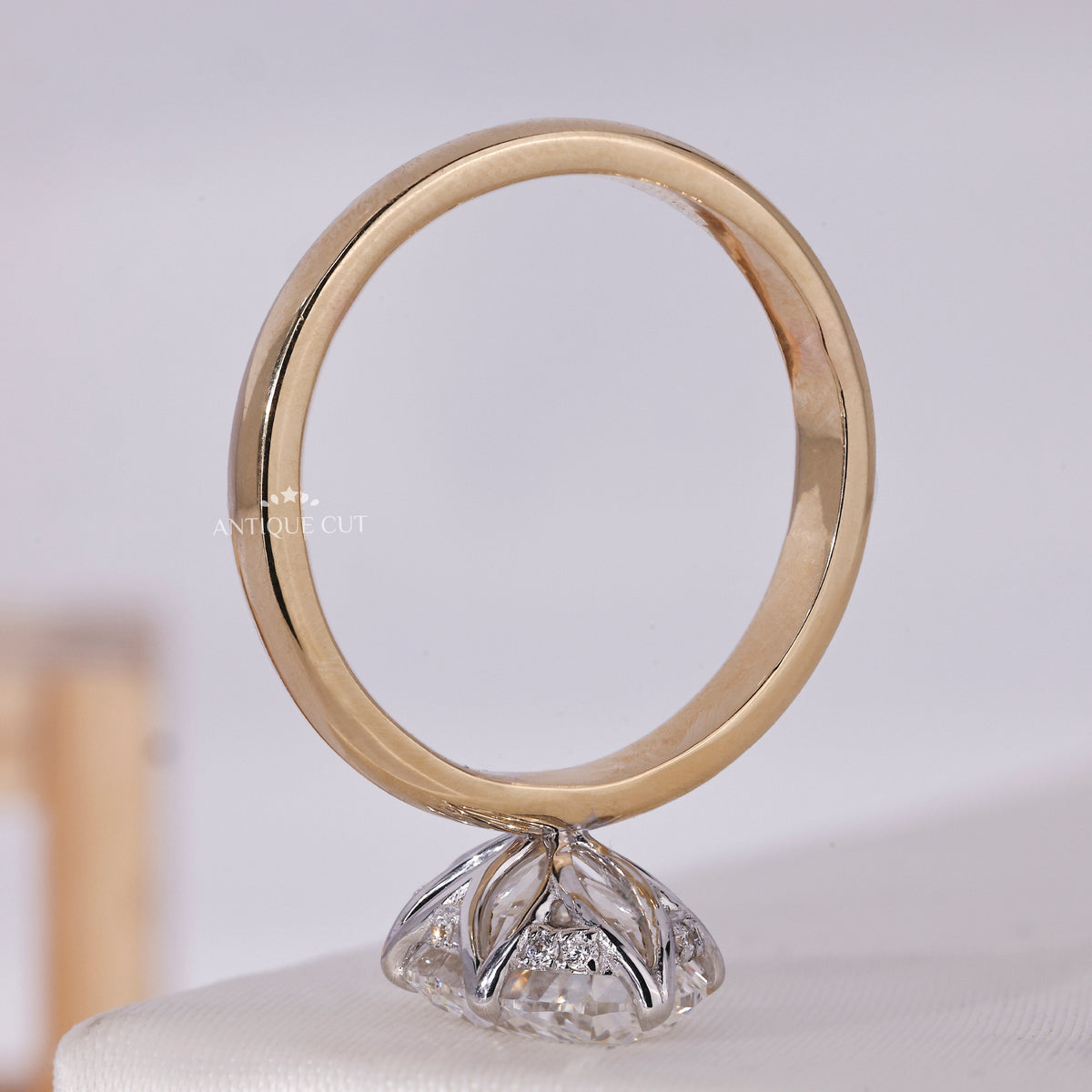 Oval diamond hidden halo engagement ring