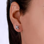 White gold diamond butterfly earrings with detailed setting