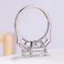 Three stone emerald engagement ring front view