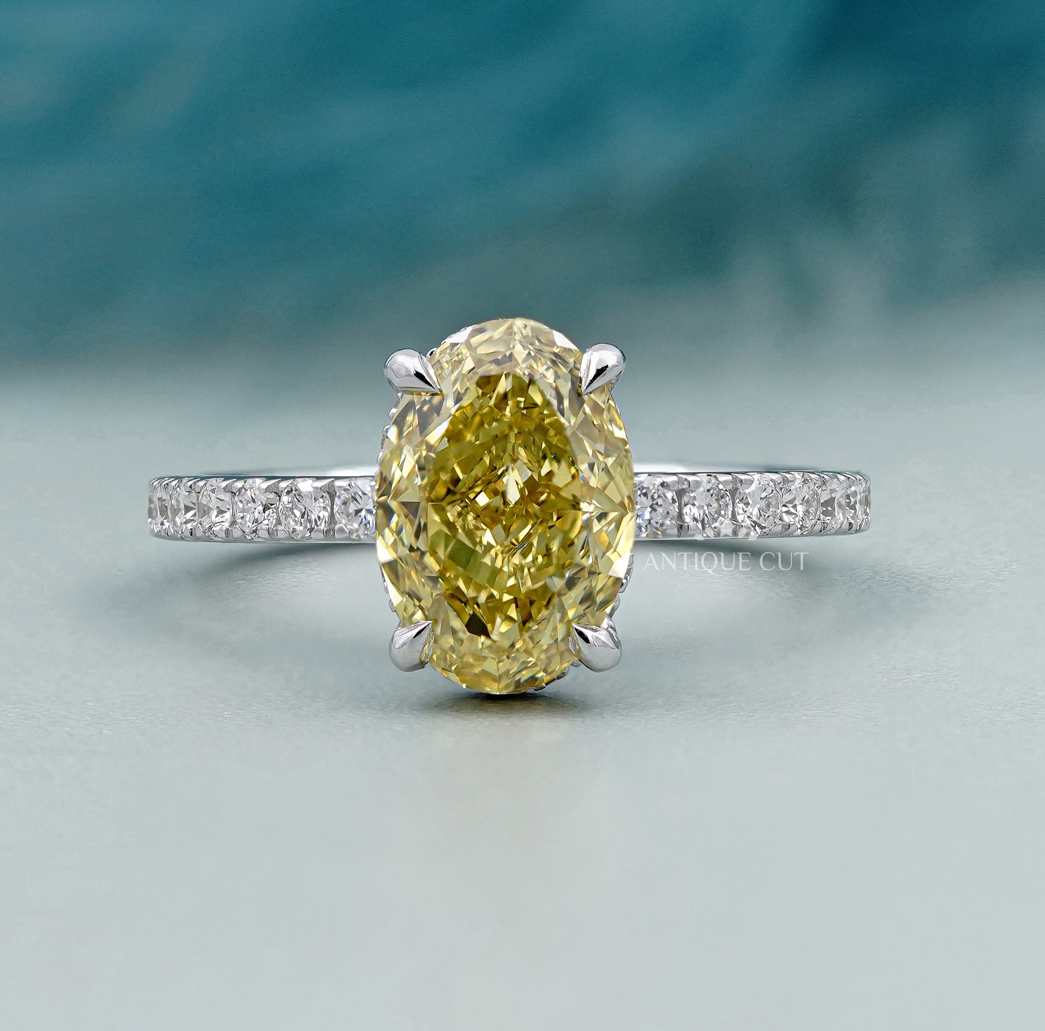 Lab grown oval cut yellow diamond engagement ring