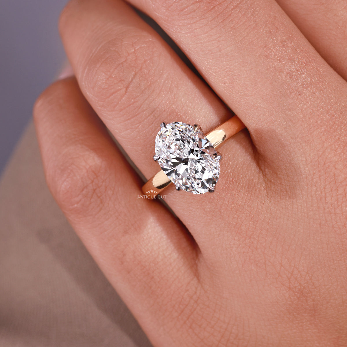 Lab grown oval engagement ring with hidden halo