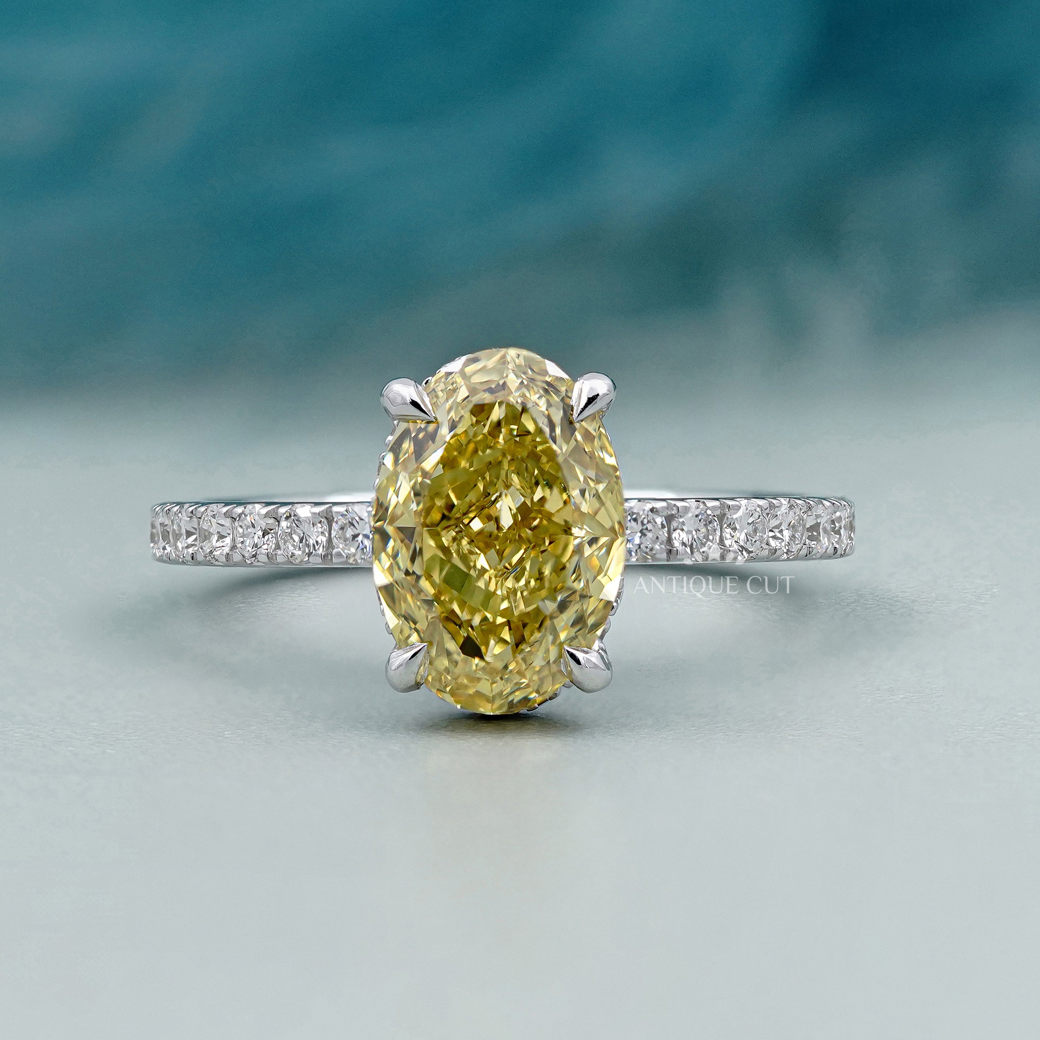 Yellow oval diamond ring pave band hidden halo white gold