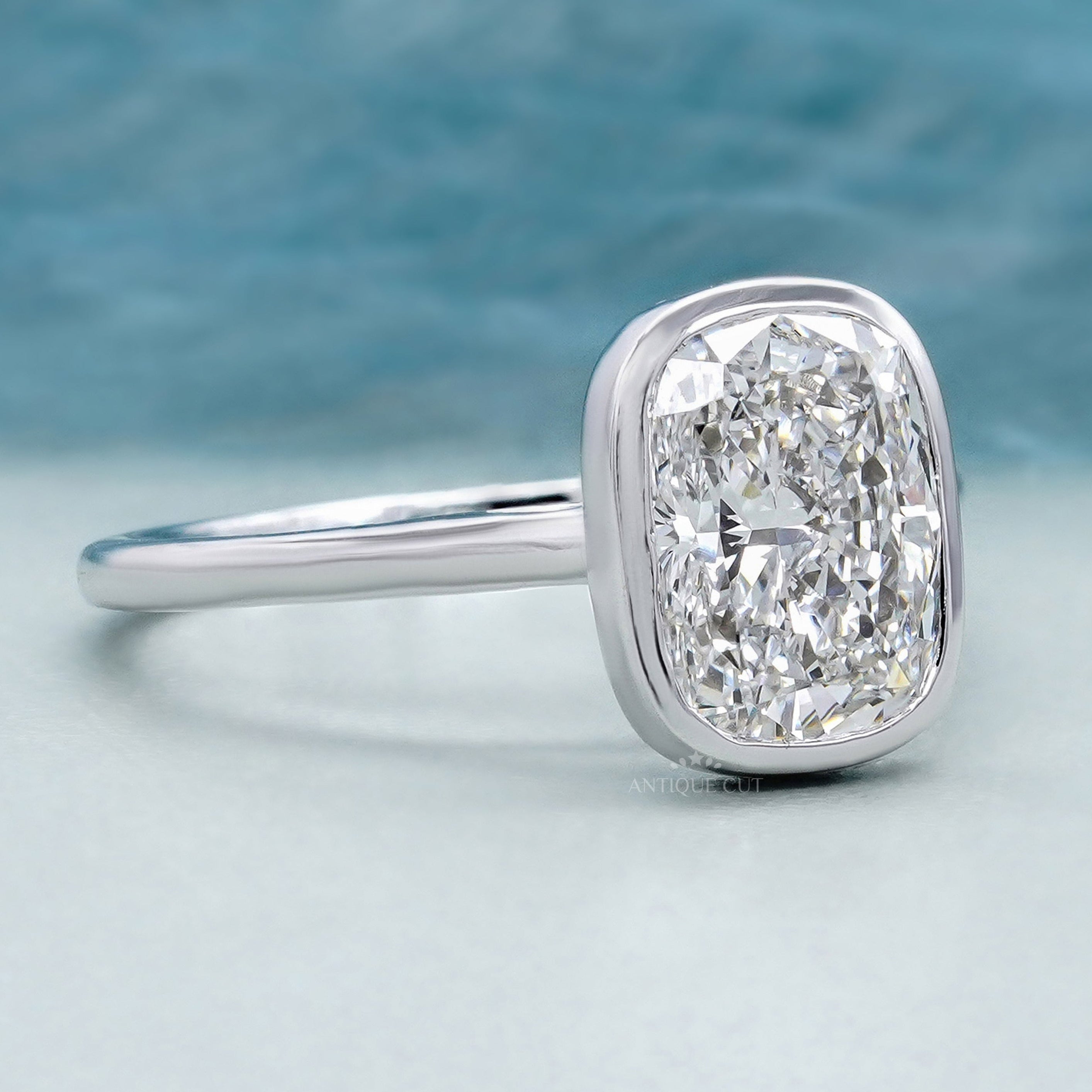 White gold cushion cut diamond solitaire ring